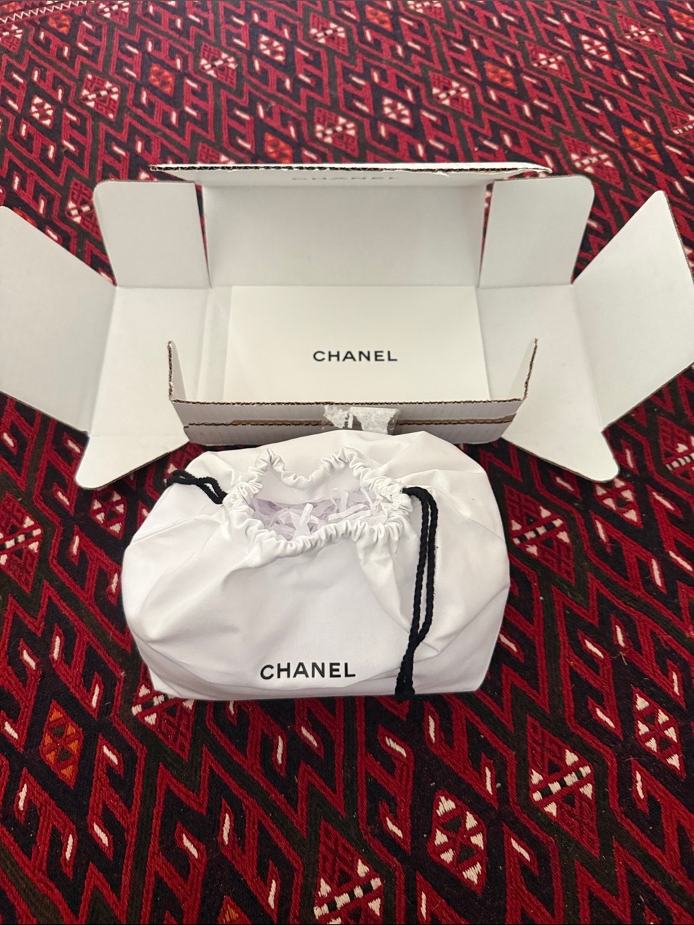 CHANEL White Drawstring Pouch with Black Cord 
Small dust bag